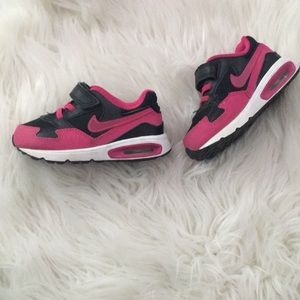 pink and black nike tns